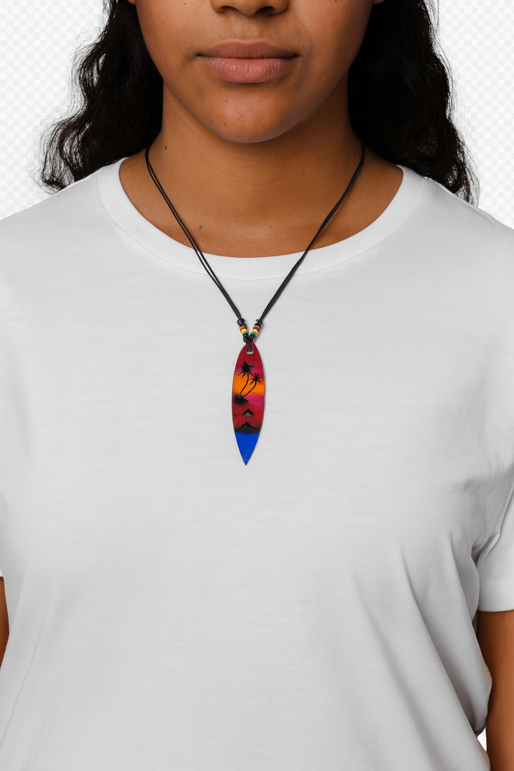 Person wearing a colorful pendant necklace on a white background