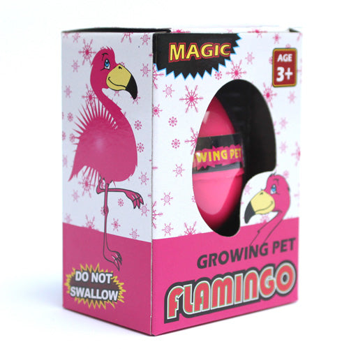 Box of a 'Growing Pet Flamingo' toy with pink flamingo design and text.